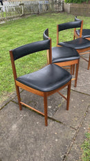 McIntosh Teak Extending Dining
Table And 4 Chair Tuck Under Set
1960s Mid Century
