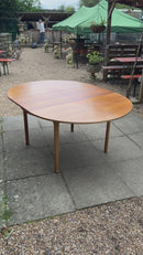 McIntosh Teak Extending Dining
Table And 4 Chair Tuck Under Set
1960s Mid Century