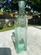 The Chasa Vogeler Co.Antique Aqua Green Glass Bottle - Vintage Glass BottleVintage FrogBottle